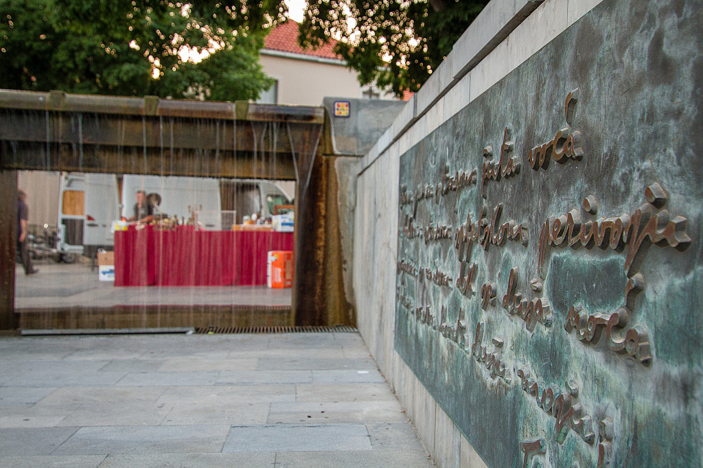 Waterfall and Inscription Plaque across from Sculpture of Gregorious of Nin in Split Croatia
