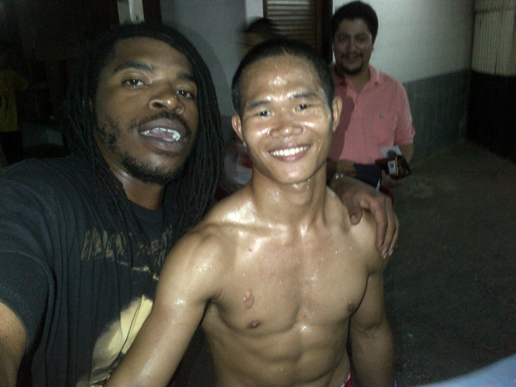 With Muay Thai fighter in Lumpini Stadium, Bangkok