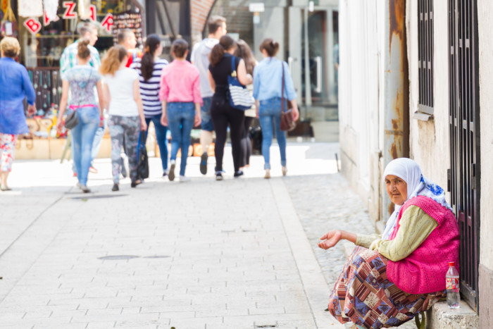 Woman begging in Sarajevo